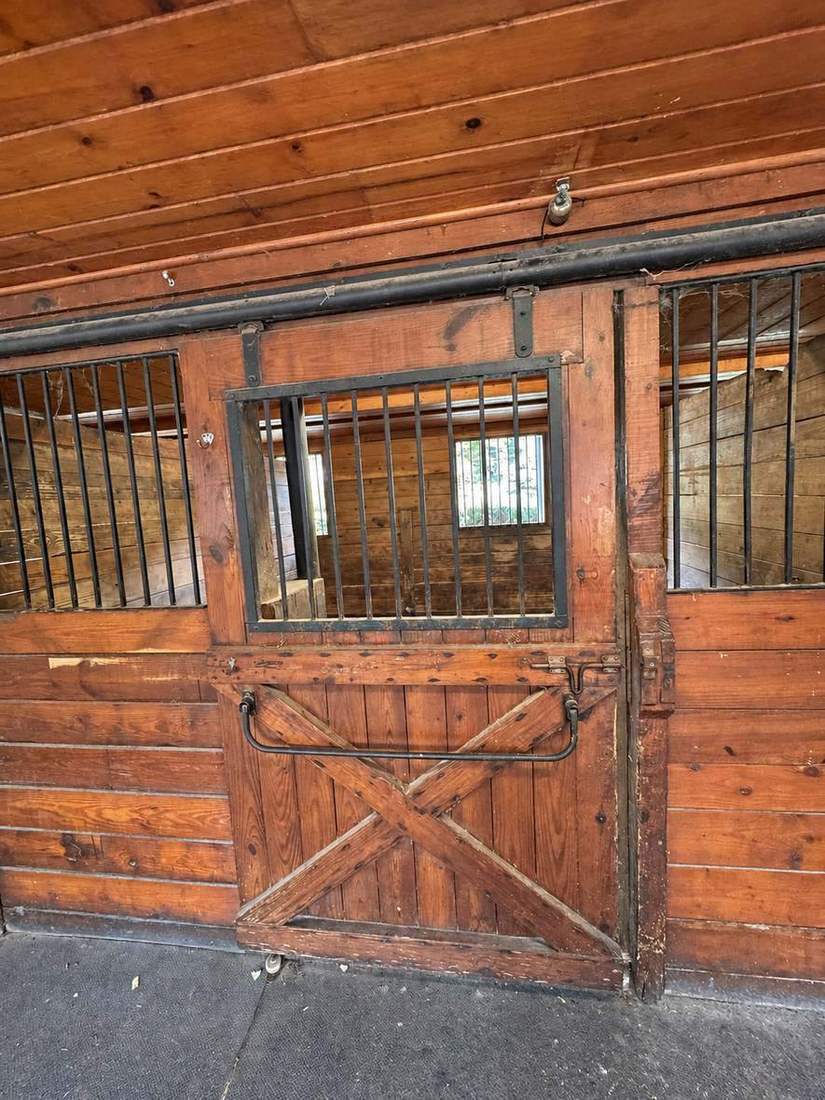 Traditional wood dutch-door stalls