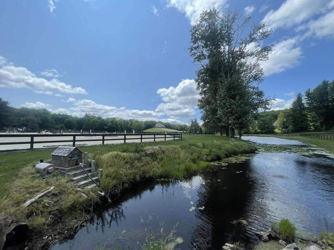 The Aspetuck River winds through the farm